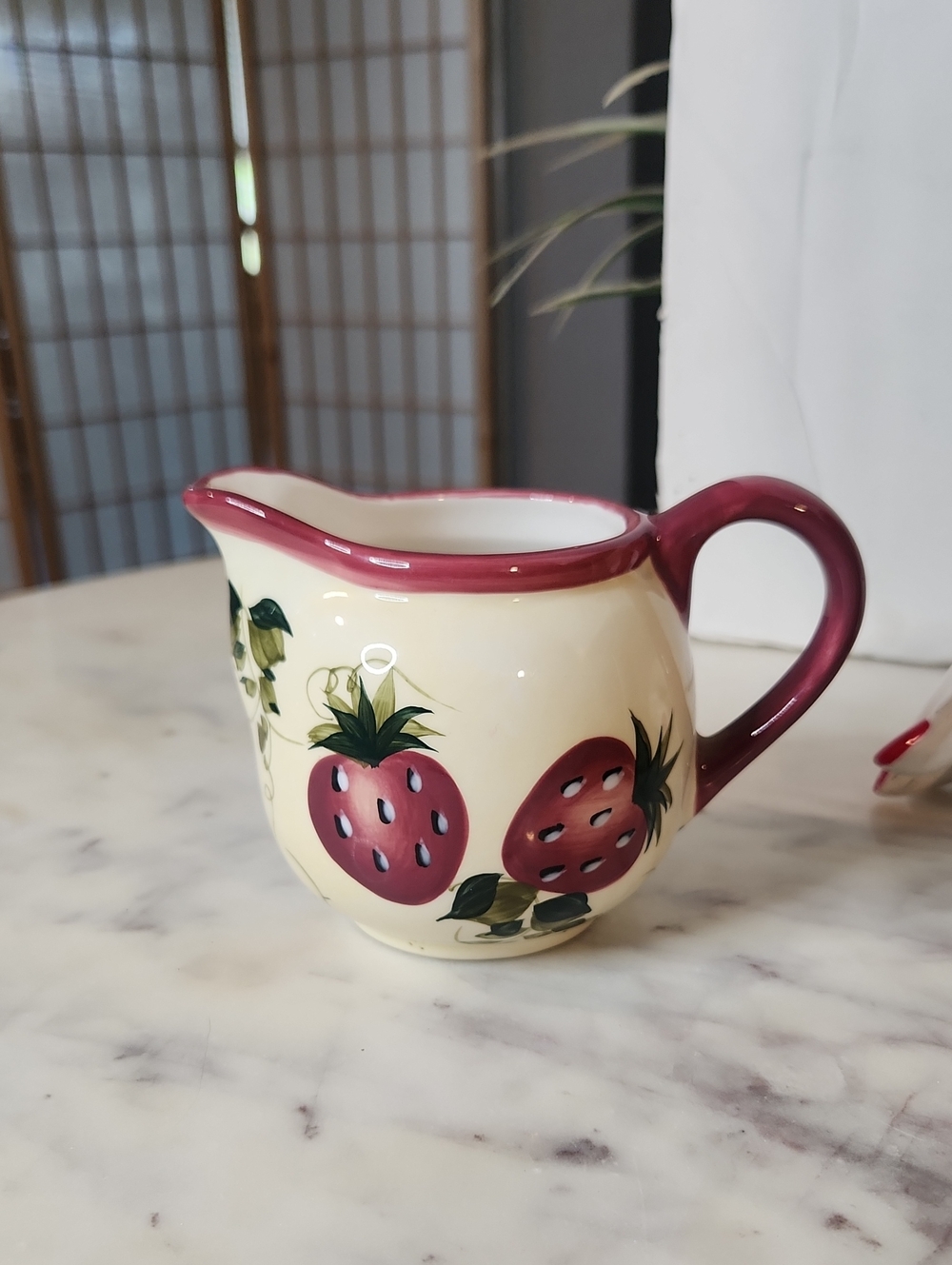 Oneida Cream Ceramic Strawberry Pitcher with Red Trim